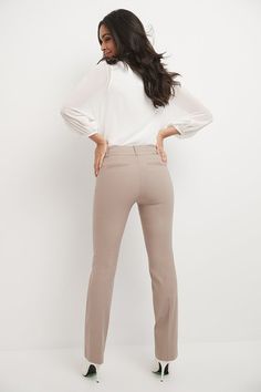 You want to be known for your work but, at the same time, also make a statement with your signature look. These barely bootcut pants let you strike the right balance between flamboyant and subtle. The modern, slightly narrower leg of these pants preserve everything good about the classic bootcut design, while the soft waistband supports and has a slimming effect on your figure. Pair them up with formal or casual tops to easily get the perfect look for any occasion. Faux front and back pockets wi Tailored Flare Dress Pants For Office, Tailored Flare Bottoms For Office, Classic Flare Workwear Bottoms, Tailored Flare Office Bottoms, Classic Fitted Flares For Workwear, Tailored Flare Bottoms For Business Casual, Elegant Straight Leg Flares For Workwear, Elegant Stretch Flares With Straight Leg, Elegant Stretch Straight Leg Flares