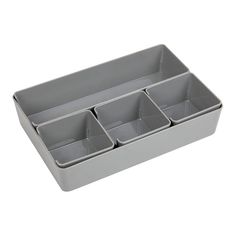 a gray tray with four compartments on it