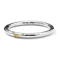 This 925 silver bangle is crafted by hand in Italy. Its thick profile and hand-hammered surface create a luminous piece that is striking alone, while its light weight allows you to add it to your favorite stack of bangles and wear it all day and into the evening. It's beauty is enhanced by the 18K gold plate, bearing Ippolita's unmistakable signature.• 925 E.F. Sterling Silver• Features 18K Gold IPPOLITA Signature • Excluded from promotion Ippolita Jewelry, Classic Bangles, Hinged Ring, Hammered Bangles, Bangles Jewelry Designs, Roberto Coin, Long Chain Necklace, Teardrop Necklace, Silver Bangle