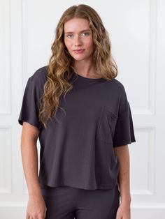 Elevate your sleepwear with our Women's Bamboo Waffle Knit Tee. Featuring a cozy waffle texture with a loose fit, dropped shoulder, and a front pocket that provides a relaxed and effortless look. Not only is this women's waffle tee comfortable and chic, but lightweight, breathable, and odor-neutralizing to keep you feeling fresh through hours of wear. Women's Bamboo Viscose Waffle Knit T-Shirt in Iron (Size: Small) - Cozy Earth Cotton Waffle Knit Tops For Loungewear, Relaxed Fit Soft Cotton Tops, Soft Cozy Cotton Tops, Casual Soft-washed Tops For Lounging, Relaxed Fit Sleep Top, Cozy Soft Cotton Tops, Comfy Relaxed Fit Sleep Tops, Comfy Soft Knit Tops With Relaxed Fit, Casual Super Soft Top For Everyday