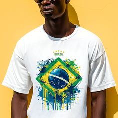 Support the Brazil national team in style with this customizable Brazil soccer t-shirt! Perfect for the upcoming Copa America, this exclusive design features a yarn-textured coat of arms on a clean white background, showcasing the essence of Brazilian pride. The emblem includes a central blue globe with the Southern Cross constellation, surrounded by a green and yellow yarn wreath representing Brazil's national colors, and topped with a golden armillary sphere. Five stars are prominently display White Cotton T-shirt For Fan Events, Sports Fan T-shirt With Short Sleeves, White Sports Fan T-shirt For Fan Events, Sports Fan Cotton T-shirt For Fan Events, Graphic Print Crew Neck T-shirt For Sports Events, Streetwear Sublimation T-shirt With Team Name, Sports Fan T-shirt With Screen Print And Crew Neck, Streetwear Sublimation Short Sleeve With Team Name, Fan Apparel T-shirt With Crew Neck For Fan Events