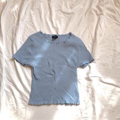 Never Worn Perfect Condition Fitted Blue T-shirt For Summer, Fitted Blue Ribbed T-shirt, Light Blue Fitted T-shirt For Summer, Fitted Light Blue T-shirt For Summer, Trendy Blue Ribbed T-shirt, Blue Basic Fitted Top, Light Blue Ribbed Summer Top, Basic Blue Fitted Top, Basic Fitted Blue Top