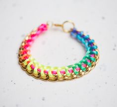 Modern silky luster rainbow braided bracelet made with silver or gold tone lightweight chain and neon colorful cord.Available lengths of bracelet: approx; 19 cm long (7 1/2 inches) including losster claspapprox. 20 cm long (8 inches) including lobster claspapprox. 21,5cm (8 1/2 inches) including lobster claspIf you need another length - don't hesitate to convo me!***This listing is for ONE braided bracelet with silver or gold tone chain!***Find more bracelets here: http://www.etsy.com/shop/daimb Trendy Multicolor Chain Bracelet For Party, Multicolor Chain Bracelets For Party, Trendy Multicolor Chain Bracelet, Trendy Handmade Rainbow Braided Bracelets, Handmade Trendy Rainbow Braided Bracelets, Rainbow Braids, Chain Braid, Braided Bracelet, New Crafts