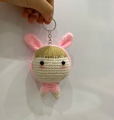 a crocheted keychain shaped like a bunny