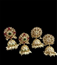 Sabyasachi Inspired Uncut Polki Kundan Designer Earrings. Gold plated. Gorgeous high quality sparkly kundan designer dangle drop earrings. It increased the effect of Royal look and beauty.  Available in 2 colours, multicolour and gold Length 6cm If have any queries please ask. Festive Hand Set Jhumkas For Party, Festive Stone Work Danglers For Reception, Reception Stone Work Danglers, Meenakari Earrings For Festive Reception, Festive Traditional Danglers For Reception, Hand Set Kundan Jhumkas For Party, Festive Hand Set Jhumkas For Receptions, Bollywood Style Jhumkas For Reception And Festivals, Heavy Kundan Earrings For Reception