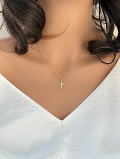 14k Gold pattern Cross Necklace. Solid 14k gold Cross Necklace .  IT is perfect for a person who like to wear between the tiny and small cross necklace. 14K Gold Yellow 8x15mm Cross Charms with Design. Introducing our patterned cross necklace: a blend of elegance and modern style. Crafted with intricate detail, this piece adds sophistication to any look. Symbolize your faith with flair or elevate your ensemble effortlessly. Simply beautiful! Model is wearing an 16" length. It consists of ... -14 Dainty 14k Gold Hypoallergenic Necklace, Dainty Hypoallergenic 14k Gold Necklaces, Dainty Hypoallergenic 14k Gold Necklace, Delicate Hypoallergenic 14k Gold Necklace, Hypoallergenic 14k Gold Necklace, 14k Gold Cross Pendant Jewelry For Everyday, Dainty 14k Gold Hypoallergenic Charm Necklaces, Gold 14k Cross Pendant Charm Necklace, 14k Gold Cross Pendant Charm Necklace