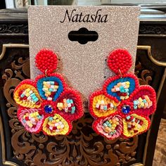 Beaded Flower Dangle Earrings By Natasha New With Tag Super Cute & Lightweight Mixed Beads Of Multiple Colors With Blue Faceted Rhinestone In Center Felt Back Post Closure 2.5” Long Dangle 2” Wide Handmade Red Flower Earrings For Party, Red Beaded Flower Shaped Jewelry, Adjustable Red Flower Beaded Earrings, Multicolor Beaded Flower Earrings For Party, Flower Shaped Earrings With Colorful Beads For Party, Flower-shaped Earrings With Colorful Beads For Party, Red Drop Flower Earrings For Festive Occasions, Colorful Beaded Flower Earrings For Party, Multicolor Flower Earrings With Colorful Beads