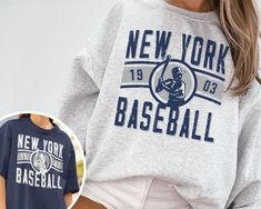 "WELCOME TO MY STORE ♥️ _This Vintage New York Yankee EST 1903 Sweatshirt / T-Shirt, Yankees Crewneck Sweatshirt, New York Baseball Shirt, Retro Yankees Shirt, NY Shirt, New York Sweater, Yankees Sweater, Yankees Sweatshirt, World Series, NY Game Day Shirt, NY Baseball, Vintage Baseball Tee, Yankees Fan Gift, Gift for her, Gift for Mom, Gift for him, Baseball Season, Retro New York. _Please check Color and Size Charts before placing the order. You can find them in the listing's photos (Depending Relaxed Fit Lettering Tops For Sports Events, Relaxed Fit Tops With Lettering For Sports Events, Sports Season Crew Neck T-shirt With Lettering, Sports Season Lettering Crew Neck T-shirt, Long Sleeve Graphic T-shirt For Baseball Season, Sporty T-shirt With Lettering And Crew Neck, Sporty T-shirt With Lettering, Crew Neck, Long Sleeve Graphic Print T-shirt For Baseball Season, Long Sleeve T-shirt With Graphic Print For Baseball Season