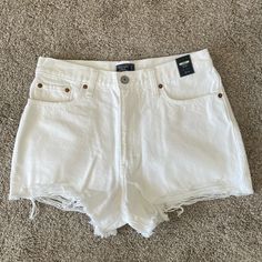 Nwt Abercrombie & Fitch Annie High Rise Shorts In Distressed White White Fitted Bottoms With Frayed Hem, Fitted White Bottoms With Frayed Hem, White High Waist Relaxed Fit Jean Shorts, White Relaxed Fit High-waisted Shorts, White Summer Shorts With Frayed Hem, White Frayed Hem Summer Shorts, White Cutoff Summer Bottoms, White High Waist Shorts With Frayed Hem, White High-waisted Shorts With Frayed Hem