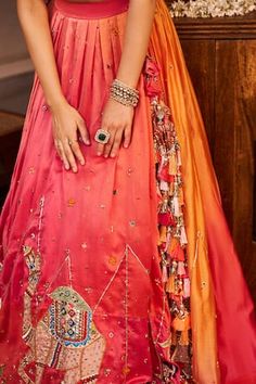 Pink and peach ombre lehenga with sequins, beads, cutdana, nakshi and tassels embroidered desert and camel motifs. Paired with coordinating thread and lace embroidered bustier. - Aza Fashions Bohemian Orange Sharara For Festive Occasions, Festive Orange Bohemian Sharara, Festive Bohemian Orange Sharara, Bohemian Anarkali Set With Dori Work For Wedding, Bohemian Anarkali Set For Wedding With Dori Work, Designer Orange Lehenga With Mirror Work, Designer Wear Orange Lehenga With Mirror Work, Bohemian Orange Sets With Zari Work, Bohemian Orange Choli For Wedding