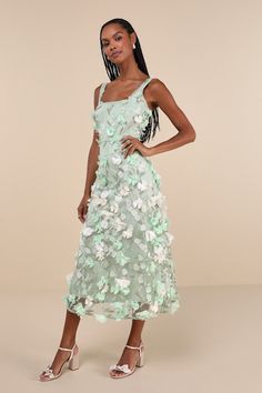 You'll be at the top of the style ranks when you twirl through the day in the Lulus Elite Cutie Mint Green Mesh 3D Floral Embroidered Midi Dress! Airy mesh knit overlays this darling dress that boasts a profusion of embroidered leaves and floral applique details (with a 3D effect at the edges), as it shapes wide adjustable straps and a square neckline. The darted bodice and fitted waist sit atop a sweet A-line skirt that ends at a midi hem. Deep V-back lends a flirty finish! Hidden back zipper/c Fitted Floral Applique Midi Dress For Spring, Fitted Midi Dress With Floral Applique For Spring, Chic Spring Midi Dress With Floral Applique, Chic Floral Applique Spring Dress, Fitted Floral Applique Midi Dress For Garden Party, Fitted Floral Appliqué Midi Dress For Garden Party, Fitted Midi Dress With Floral Applique For Garden Party, Sleeveless Summer Dress With 3d Flowers, Knee-length Floral Applique Midi Dress For Spring