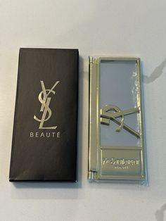 Brand New YSL Logo Mirror from Yves Saint Laurent Beauté.   Comes in black box.  Width 3.75" x Height 1.75"  Perfect to show off to all your friends that you have a rare YSL Mirror from the Yves Saint Laurent Beauty Collection. Logo Mirror, Logo Beauty, Ysl Beauty, Ysl Logo, Beauty Logo, Compact Mirror, Beauty Collection, Black Box, Beauty Box