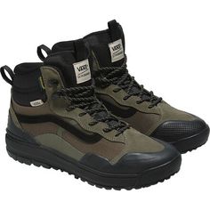 We like wearing the Ultrarange Exo Hi MTE-2 Shoe when we're kicking it around town or on our local trail for a short sunset hike. Along with sporting a classy sneaker aesthetic, this shoe takes it a step further by featuring an aggressively lugged sole for premium traction on the sidewalk and dirt pathways. Casual Sports Boots With Cushioned Footbed, Lace-up High-top Sneakers For Hiking, Fall Hiking Boots With Rubber Sole For Outdoor Activities, Round Toe Walking Shoes For Outdoor Fall Activities, Rugged Outdoor Sneakers For Fall, Casual Low-top Sports Boots, Casual Hiking Boots With Rubber Sole For Fall, Sporty High-top Hiking Sneakers With Rubber Sole, Functional High-top Sneakers With Studded Outsoles For Outdoor