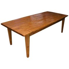 a wooden table sitting on top of a white background