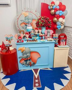 an elephant themed birthday party with balloons and decorations