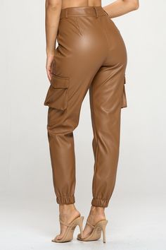 The perfect blend of trendy and practical. Constructed of PU material, these faux leather cargo pants combine dressy and casual elements, creating a look that’s both flattering and comfortable. Color: Camel - True to size with some stretch to the pant - Zipper & Button closure - Functional side flap pockets *Refer to size chart or contact us for any further questions. Leather Cargo Pants, Terry Cloth Romper, Leather Fits, Pleather Pants, Pants Large, Fall Shopping, Baggy Fits, Tight Leggings, Straight Leg Pants