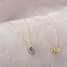 "Sapphire represents commitment in love. Our oval cut sapphire necklace surrounded by 14k solid gold diamonds is an elegant jewel for you and your loved ones with its elegant design. Time to pamper yourself and your loved ones. The color of those born in September is the color of sapphire. Our ring compatible with our necklace: https://queenjewelryturkey.etsy.com/listing/1562024493/oval-sapphire-ringreal-diamond-14k-solid?utm_source=Copy&utm_medium=ListingManager&utm_campaign=Share&utm_term=so.l Sapphire Diamond Necklace Fine Jewelry Gift, Sapphire Diamond Necklace As A Fine Jewelry Gift, Sapphire Diamond Necklace As A Gift, Sapphire Diamond Pendant Necklace For Gift, Sapphire Diamond Necklace For Gift, Gift Sapphire Diamond Cut Necklace, Sapphire Birthstone Necklace For Anniversary, Elegant Sapphire Diamond Necklace For Gift, Elegant Sapphire Birthstone Necklace For Anniversary