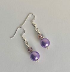 Pretty purple drop earrings  14mm pretty purple glass pearl beads 4mm purple rondelle beads Silver plated hooks Approx drop 3cm Girlie kitsch Purple Drop Earrings, Drop Earrings Silver, Purple Pearl, Purple Earrings, Pretty Purple, Pretty Necklaces, Earrings Pearl, Purple Glass, Silver Drop Earrings