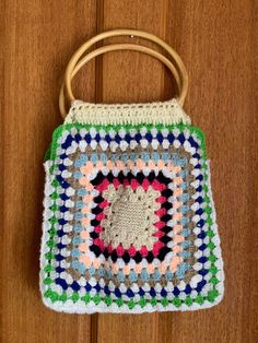 Vintage Handmade Crochet Granny Square Style Handbag with Bamboo Handles.  Beautiful, versatile handmade boho style handbag.  There are three small stains on the inside lining (see photographs) but this bag is in otherwise excellent vintage condition.  Bag body measures 38cm x 34cm. Length of bag including handles from top of handles to bottom of bag is 53cm. Crochet Grandma Square, Crochet Grandma, Crochet Granny Square, Top Handle Bags, Bamboo Handles, Crochet Granny, Boho Stil, Handmade Boho, Style Boho