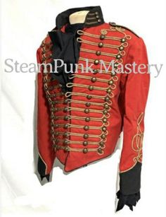 Ceremonial Men’s Military style Red/Black Jacket With Front gold Braiding jacket with black cotton ruffle shirt.This is a heavy cotton Military style jacket, it is fitted well tailored made jacket with antique brass buttons and lots of details on sleeves and collars and jacket is fully lined with black satin.Please refer to photos.Jacket is available in 44”and 46” chest sizeL - to fit chest 44” (armhole To armhole 46”)XL - 46” (armhole To armhole 48”)Front Length is 24” approximately Back length Cotton Costume Outerwear For Fall, Fall Cotton Costume Outerwear, Vintage Red Outerwear For Costume Party, Red Vintage Outerwear For Costume Party, Fitted Cotton Punk Outerwear, Red Military Long Sleeve Outerwear, Costume Outerwear With Epaulettes And Long Sleeves, Black Parade Jacket, Steampunk Man