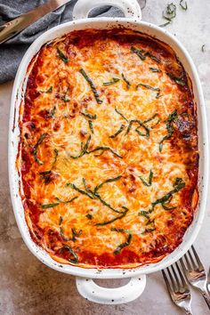 an eggplant lasagna in a casserole dish on a table