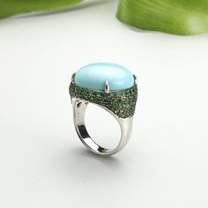 🌱Handmade 14K Turquoise ( 2.83 gram ) ring 🌱14K 585 gold and Natural Tsavorite (110 pcs) 🌱Authentic Korean jewelry 🌱Free standard shipping from Seoul, Korea with tracking 🌱Will take approximately 7-21 days to arrive, worldwide NASCHENKA is an artistic expression of Korean culture and history through traditional jewelry. We use natural and authentic stones. Each piece is thoughtfully designed by a designer and handmade by a highly skilled master artisan. Size Guide * The approximate size and Elegant Turquoise Cabochon Ring, Elegant Green Opal Ring Oval Cabochon, Elegant Green Opal Ring With Oval Cabochon, Elegant Turquoise Ring Gift, Luxury Green Multi-stone Opal Ring, Elegant Turquoise Ring, Luxury Silver Turquoise Ring With Gemstone, Turquoise Fine Jewelry With Polished Finish, Luxury Oval Turquoise Ring For Gift