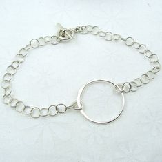 Halo Silver Circle Bracelet $28.00 https://cloverleafjewelry.com Everyday Sterling Silver Round Chain Bracelet, Sterling Silver Bracelet With Spring Ring Clasp, Sterling Silver Hammered Bracelets, Sterling Silver Round Bracelet For Everyday, Everyday Chain Bracelet With Sterling Silver Clasp, Hammered Sterling Silver Bracelets, Hammered Sterling Silver Round Bracelets, Hammered Sterling Silver Round Bracelet, Dainty Nickel-free Round Chain Bracelet