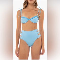 Side Cutouts Lend Sunny Energy To These High-Waist Bikini Bottoms With Gleaming Hardware And High Legs. Moderate Back Coverage Lined 85% Polyamide, 15% Elastane Hand Wash, Dry Flat Imported Brand New No Original Tag Strappy Summer Pool Bottoms, Fitted Strappy Beach Bottoms, Strappy Beachwear Bottoms For Swimming, Blue Swimwear For Water Sports In Spring, Fitted Tie-side Bottoms For Water Sports, Strappy Beachwear Bottoms For Pool, Blue Swimwear With Padded Cups For Sunbathing, Blue Swimwear With Padded Cups For Pool, Blue Swimwear With Padded Cups For Swimming