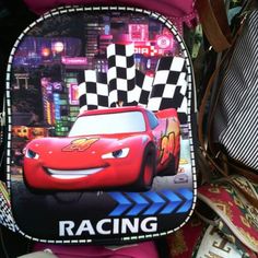 a back pack with cars on it