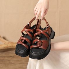 Style And Comfort Go Hand In Hand With The Capri Sandal. Hand Made With Premium Cowhide Upper. A Statement Yet Casual Look That Completes Any Outfit. Color: Black/CoffeeMaterial: CowhideLining: Genuine LeatherInsole: Genuine LeatherSole: RubberHeels: 5cm/1.97" Fit: Medium to Wide, Runs Normal.Origin: Made in China Production Time: About 5-7 days (Any exceptional case will email you, Please pay attention to your email left)Shipping Time: Free Shipping To most locations, delivery time is approxima Brown Slingback Sandals With Buckle And Round Toe, Brown Flat Heel Platform Slingback Sandals, Brown Platform Flat Heel Slingback Sandals, Trendy Brown Platform Sandals, Brown Platform Slingback Sandals With Closed Toe, Casual Brown Chunky Platform Sandals, Trendy Brown Chunky Platform Sandals, Casual Brown Sandals With Chunky Platform, Trendy Brown Sandals With Buckle Closure