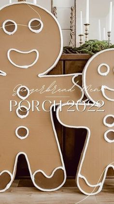 two large gingerbread cutouts sitting next to each other