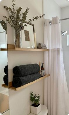 the bathroom is clean and ready to be used as a bathtub or shower stall