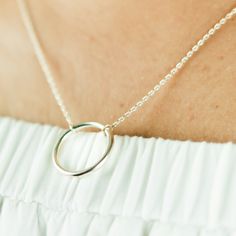 Circle Necklace in Sterling Silver. This Centred Circle Necklace symbolizes Unity, Family, Circle of Friends, Wholeness, Karma, the Sun & Moon, Strength, Circle of Life, Balance.  Simple yet very trendy and great for everyday wear and the prefect bridesmaids Gift, anniversary gift, friendship gift. DIMENSIONS: 15mm Thickness: 2mm Finish:  Bright shine 🎁 A gift box The item will be sent in a beautiful gift box ready to give as a gift. If you purchase it as a gift, I can include your note on the Circular Delicate Chain Jewelry As A Gift, Circular Delicate Chain Jewelry Gift, Circular Delicate Chain Jewelry For Gifts, Everyday Hypoallergenic Charm Necklaces, Delicate Open Circle Jewelry Gift, Delicate Open Circle Jewelry For Gift, Dainty Circle Jewelry Gift, Dainty Circular Jewelry Gift, Everyday Charm Necklace With Round Pendant And Delicate Chain