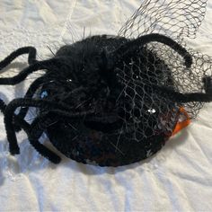 Cute Halloween Creepy Clip Hat Black Round Sequin With Spider Theme Made Of Bendable Piper (A Pipe Cleaner Or Chenille Stem Is A Type Of Brush) And Black Netting. Made For Ladies Or Kids. Gothic Black Hat For Fall, Black Novelty Hat For Halloween, Fun Black Halloween Hat, Spooky Black Costume Hat, Black Halloween Party Costume Accessories, Halloween Novelty Mini Costume Hat, Spooky Black Costume Hats And Headpieces For Party, Spooky Black Costume Hats And Headpieces For Halloween, Spooky Black Costume Accessories For Party