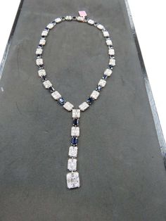 For Sale on 1stDibs - The Following Item we are offering is a Rare 18KT White Gold Large Baguette Diamond Blue Sapphire Necklace. Necklace is comprised of Finely Set Gorgeous Luxury Sapphire Necklace For Formal Occasions, Luxury Diamond Cut Necklace For Evening, Hallmarked Diamond Necklace For Evening, Evening Jewelry With Baguette Diamonds In Rectangular Shape, Rectangular Baguette Diamond Jewelry For Evening, Luxury Baguette Cut Diamond Necklace, Baguette Diamond Jewelry For Evening, Formal Baguette Diamond Necklaces, Luxury Evening Necklace With Baguette Diamonds