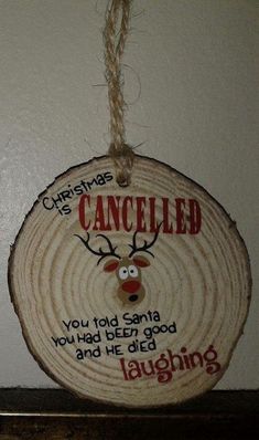 a christmas ornament hanging on a wall with the words, you told santa you had been good and he did laughing