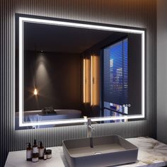 a bathroom sink sitting under a large mirror