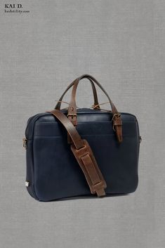 Made from vegetable-tanned leather. Handmade in France. Size: 38 cm x 28 cm x 6 cm Elegant Blue Smooth Grain Bags, Blue Textured Leather Tote Shoulder Bag, Blue Rectangular Satchel With Leather Lining, Blue Shoulder Bag With Leather Lining, Blue Top Handle Shoulder Bag With Leather Lining, Formal Blue Bag With Leather Lining, Classic Navy Bag For Formal Occasions, Formal Blue Smooth Grain Bag, Classic Navy Formal Bag