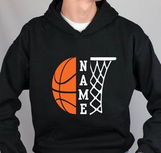 a young man wearing a black hoodie with an orange basketball on it