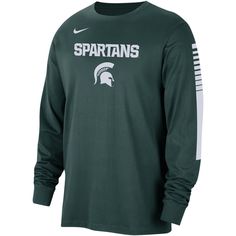 The Men's Nike Green Michigan State Spartans Slam Dunk Long Sleeve T-shirt is the perfect way to show your support for the Spartans. With screen-printed graphics and a loose fit, this shirt is both comfortable and stylish. Made from 100% cotton, this shirt is sure to keep you cool and comfortable all game long. Whether you're cheering on the Spartans at the game or just relaxing at home, this shirt is a must-have for any fan. The Michigan State Spartans are one of the most successful college bas Nike Collegiate Long Sleeve T-shirt, Long Sleeve Logo Print Tops For Fan Gear, Nike Long Sleeve Fan Gear Top, Collegiate Long Sleeve Sports T-shirt, Collegiate Nike Cotton Tops, Nike Crew Neck Tops For College, Green Long Sleeve Fan Apparel Top, Nike Sports Tops With Screen Print, Nike Tops With Screen Print For Fans