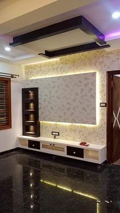 a living room with black marble flooring and white wallpaper, lighted by recessed lights