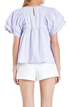 Tiered scalloped ruffles with embroidered edges charm an airy cotton top styled in a sweet babydoll silhouette. Back keyhole with button-and-loop closure Jewel neck Short sleeves 100% cotton Hand wash, dry flat Imported Feminine Scalloped Edges Top For Summer, Feminine Cotton Tops With Scalloped Edges, Cotton Short Sleeve Tops With Scalloped Edges, Cotton Tops With Scalloped Edges And Short Sleeves, Short Sleeve Cotton Tops With Scalloped Edges, Spring Cotton Top With Scalloped Edges, Spring Tops With Scalloped Edges For Daywear, Summer Cotton Tops With Scalloped Edges, Spring Short Sleeve Tops With Scalloped Edges