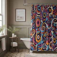 a colorful shower curtain in a bathroom