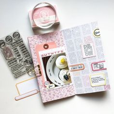 an open scrapbook with some stamps on it