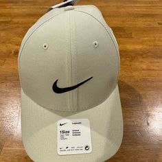 Nike Golf Legacy 91 Cap Hat Osfa White Unisex Cu9892 025 Dri Fit New With Tags White With Black Swoosh On Front (See Picture) One Size 98% Polyester 2% Spandex New With Tags (Retails $35) Elevate Your Sporty Style With The Nike Golf Legacy 91 Cap Hat! This Unisex Baseball Cap Features An Adjustable Strapback For A Comfortable Fit And Is Made Of A Durable Polyester And Spandex Material With A Canvas Fabric Type. The Solid White Color And Iconic Nike Swoosh Character Make It Perfect For Athletic O Nike Baseball Cap With Curved Brim For Sports, Nike Curved Brim Baseball Cap For Sports, Nike Breathable Baseball Cap With Curved Brim, Nike Outdoor Hat With Curved Visor, Nike Sporty Hat With Curved Visor, Sporty Nike Hat With Curved Visor, Nike Sports Dad Cap, Nike Sports Dad Hat, Nike Breathable Baseball Cap