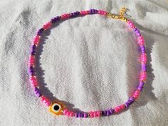 Evil Eye Necklace, Beaded Evil Eye Necklace, Turkish Evil Eye Pendant Pink Evil Eye Necklace Nazar Necklace Cute Purple Evil Eye Bead Choker, Evil Eye Necklace for Summer Necklace lenght is minimum 15 and maximum 16 inches. I ship your jewelry 1-2 bussiness day. Please include your phone number for shipping company. Thank you :) <3 Trendy Purple Necklace With Round Beads, Trendy Purple Round Bead Necklaces, Trendy Purple Beads For Gifts, Trendy Purple Beaded Necklace For Gift, Trendy Spacer Beads For Gifts, Trendy Necklaces With Spacer Beads For Gifts, Trendy Necklace With Spacer Beads For Gifts, Heart Beads Choker Necklace As Gift, Trendy Purple Round Bead Necklace