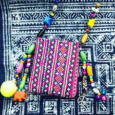 If you love bohemian style , you must have these exotic amulet purse! They are made from vintage Hmong skirt and accented with beads , bells , pompom or tassel.Please acceptance that the bag may not be exactly the same pattern because I cut from the vintage embroidery blouse. Yellow peace with Ohm  Size around 6.5 cm. X 7.5 Elephant  Size 7.5 cm.x 7.5 cm. Bohemian Shoulder Bag With Tassels As Gift, Bohemian Shoulder Bag With Tassels For Gift, Beaded Bohemian Shoulder Bag For Festival, Bohemian Handmade Pink Shoulder Bag, Traditional Beaded Shoulder Bag For Festivals, Bohemian Beaded Shoulder Bag For Gift, Bohemian Fair Trade Bags For Festivals, Bohemian Beaded Bags With Multicolor Embroidery, Hippie Festival Handwoven Shoulder Bag