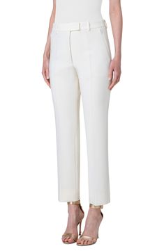 Cut from double-face wool with plenty of shape-retaining stretch, these tailored pants end at the ankles for a footwear-featuring look. 29" inseam; 16 1/2" leg opening; 11 1/4" front rise; 16" back rise (size 8) Zip fly with hook-and-bar closure Front slant zip pockets; back welt pockets 96% wool, 4% elastane Dry clean Made in Romania Designer Clothing Elegant Structured Fitted Pants, Elegant Cream Pants For Formal Occasions, Elegant Cream Formal Pants, Tailored Elegant Pants, Elegant Tailored Cream Bottoms, Elegant Tailored Cream Pants, Elegant Tailored Structured Pants, Elegant Structured Office Pants, Elegant Structured Pants For Office