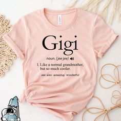 a pink t - shirt with the words gigi on it