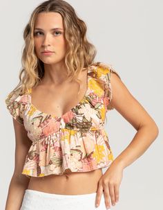 Roxy Brisa Woven Top. Allover Floral Print. V-Neckline. Elastic Waist. Flutter Sleeves. Raw Edge Hem. 100% Cotton. Machine Wash. Imported. Model Is Wearing A Size Small. Model Measurements:height: 5'7" Bust: 29"waist: 22"hips: 34.5" Printed V-neck Crop Top For Summer, Floral Print V-neck Crop Top For Beach, Summer Printed Top With Flutter Sleeves, Summer V-neck Top For Beach, Summer V-neck Crop Top For Brunch, Summer Printed Flutter Sleeve Tops, Printed Flutter Sleeve Tops For Summer, Summer Flutter Sleeve Printed Tops, Ruffled Short Sleeve Crop Top For Beach